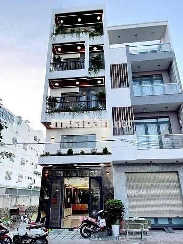 Cho Thuê Nhà Mới Xây DT 220m2 1Trệt 1Lửng 3Lầu 5Pn 6Wc Hẻm 12m Đổ Ôtô