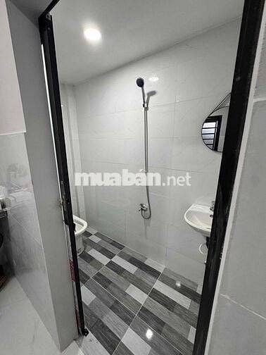 cần bán dãy nhà trọ 12 phòng có sẵn máy lạnh , hiện đang có full