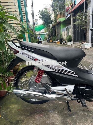 Wave 50cc  màu trắng bánh căm thắng đĩa