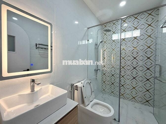 Nhỉnh 10 tỷ HXH Phạm Văn Đồng 3 tầng 4PN gara oto nội thất cao cấp