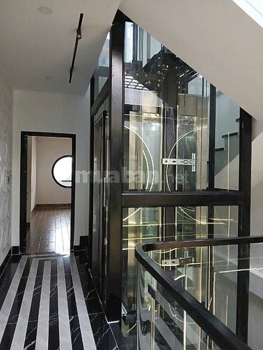 Nhà dt108m2 đúc 5 tầng 8pn thang máy hẻm 12m Lê Văn Quới,Q.Bình Tân