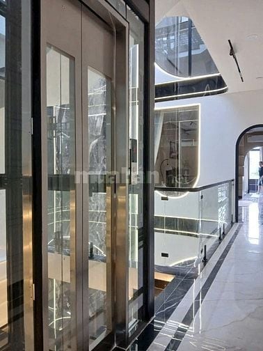 Nhà dt108m2 đúc 5 tầng 8pn thang máy hẻm 12m Lê Văn Quới,Q.Bình Tân