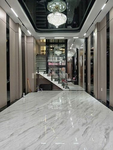 Nhà dt100m2 đúc 5 tầng 8pn thang máy hẻm 12m Lê Văn Quới,Q.Bình Tân