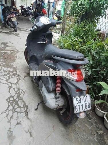 Liberty 3v ie. Biển số thành phố.