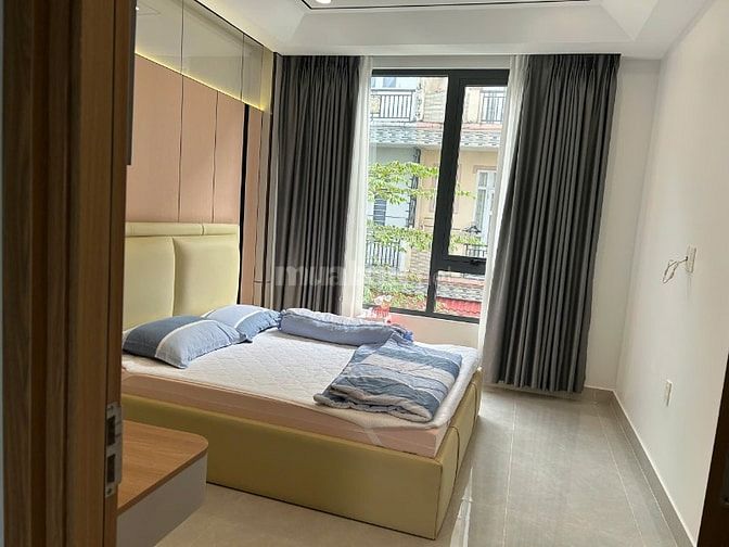 Nhà mới xây xong 2 MT đg rộng ngay ngã ba bà băng.5x16m-3 lầu-4pn-5wc