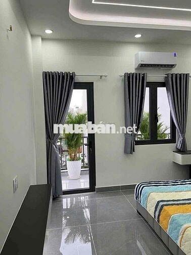 nhà phố trung tâm tân chánh hiệp( trung mỹ tây mới) sau lưng bvien q12