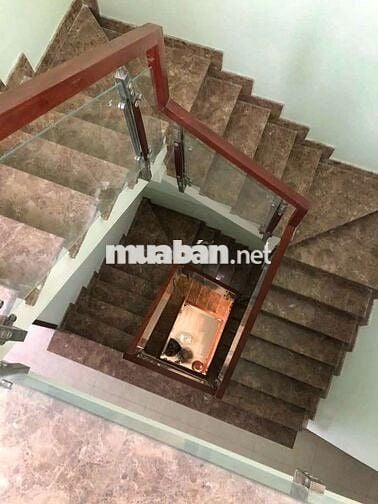 NHÀ  XÂY KIÊN CỐ 4 LẦU 1 XẸC ĐƯỜNG LÊ VĂN KHƯƠNG PHƯỜNG HIỆP THÀNH.Q12