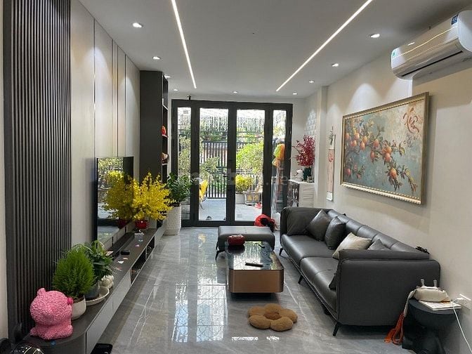 Bán nhà tập thể lô góc quận Đống Đa, S 50/100m sổ đỏ cất két oto đỗ cử