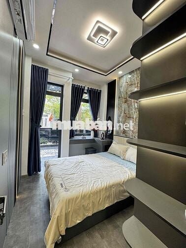 Nhà lầu 4 phòng ngủ hẻm thông, nội thất như hình, đg Lê Văn Lương