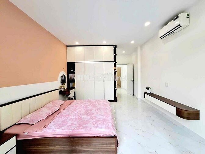 1 căn *** Q. Tân Phú nhà mới 100% hẽm xe hơi thông