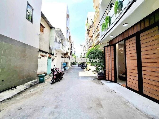 1 căn *** Q. Tân Phú nhà mới 100% hẽm xe hơi thông