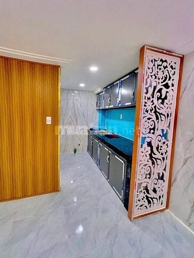 Nhà 1 trệt 1 lầu (4x7,5) đường Lâm Thị Hố Q12 giá 1t1 còn thương lượng