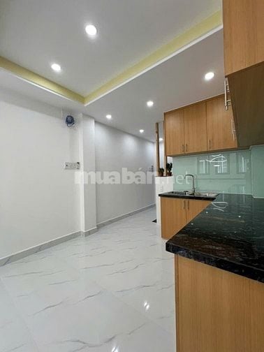 Bán nhà mới xây 100% - 4 tầng. Hẻm Xe Hơi – 128 Bàn Cờ, P.3, Q.3