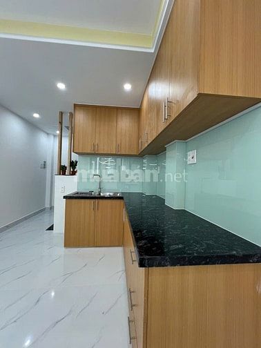 Bán nhà mới xây 100% - 4 tầng. Hẻm Xe Hơi – 128 Bàn Cờ, P.3, Q.3