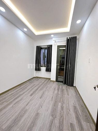 Nhà Nơ Trang Long 34.6m² xây 1 trệt 2 lầu, giá 1.99 tỷ. Hẻm 4m, sổ sẵn