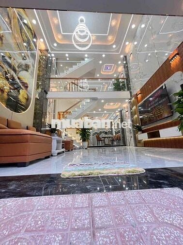 1 trệt 1 lửng 3 lầu. 5 pn. 5tolet. đường 10m sân thượng trước sau