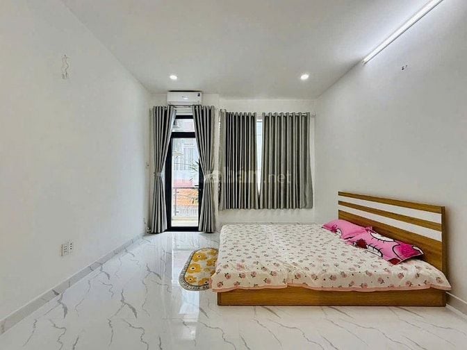 Gần Lotte Mart. Căn 53.3m² Nguyễn Văn Lượng, xây 1 trệt 2 lầu. Sổ sẵn