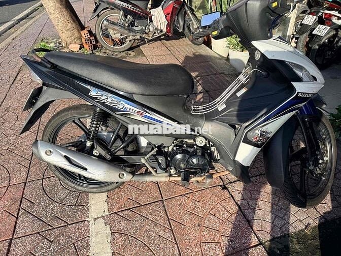 Suzuki Viva 2015 Trắng Xanh Đen