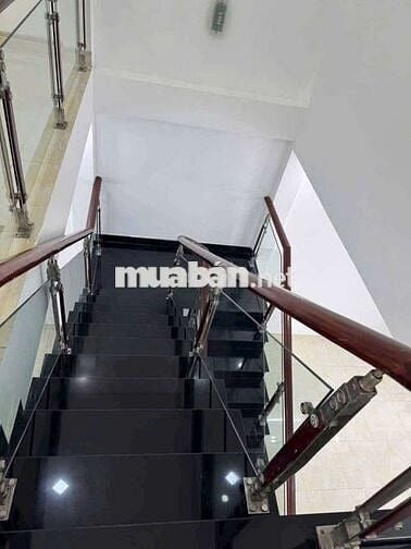 Nhà trệt 1 lầu gần chợ chánh mỹ. DT: 5x26, thổ cư: 60,đường nhựa thông