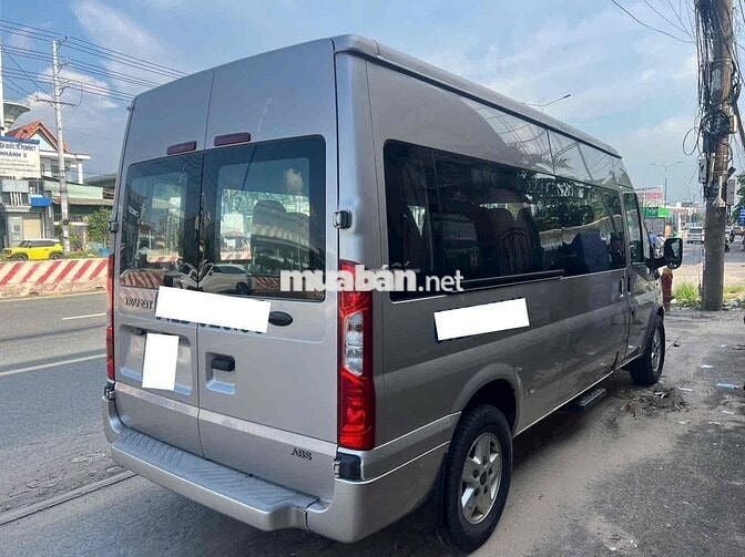 Ford Transit 2015 Luxury xe chở nhân viên đi kỹ