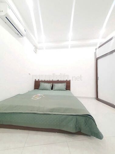 Bán nhà linh quang 37m2,6 tầng khung cột,8 phòng,20m ra ô tránh,9,2 tỷ