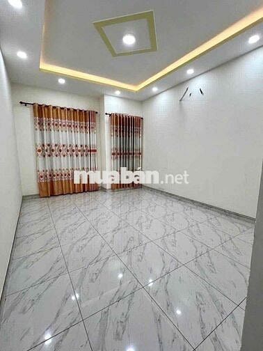 nhà mặt tiền gần Siêu Thị Go,gần chợ Dĩ An 1,có nội thất.sân xe hơi