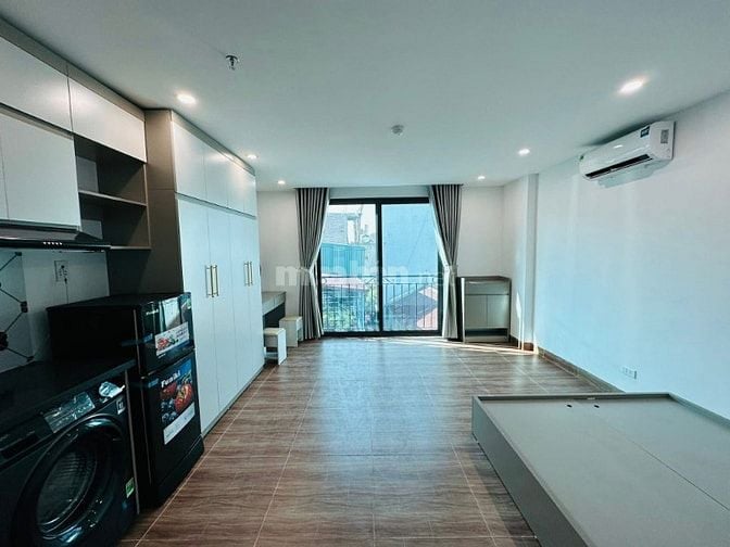 Bán nhà Lạc Long Quân, 100m2, 7 tầng thang máy, ngõ thông, ô tô qua