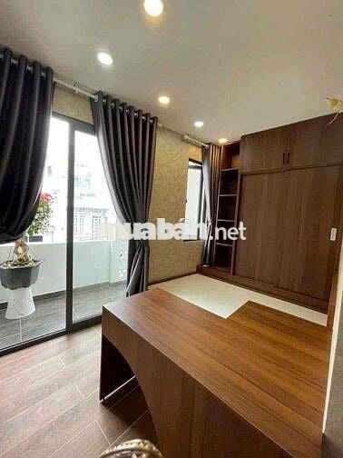 Nhà mặt tiền 4 tầng kd siêu đẹp mới 48m2 (4,2m x 12m) Trần Thủ Độ