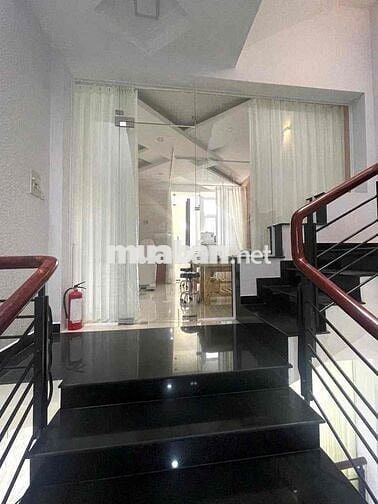 CHO THUÊ NHÀ MẶT TIỀN ĐƯỜNG HOA LAN,PHÚ NHUẬN(HẦM,LỬNG,3LẦU,7PN,8WC