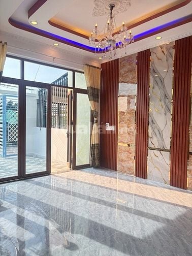 Cần bán gấp nhà 1 trệt - 1 lầu. Nhà mặt tiền đẹp phong cách hiện đại.