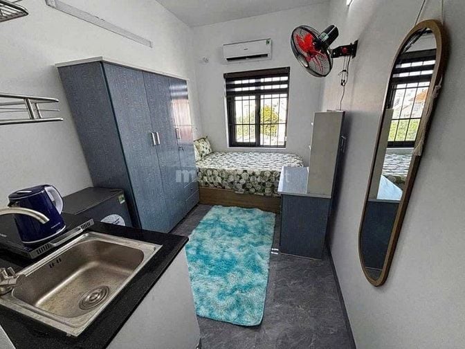 choThuê căn hộ mini 1 khách ở  có bếp nấu ăn, ban công,máy gặt riêng, 