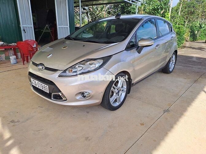 Ford Fiesta ghi vàng,122371 km