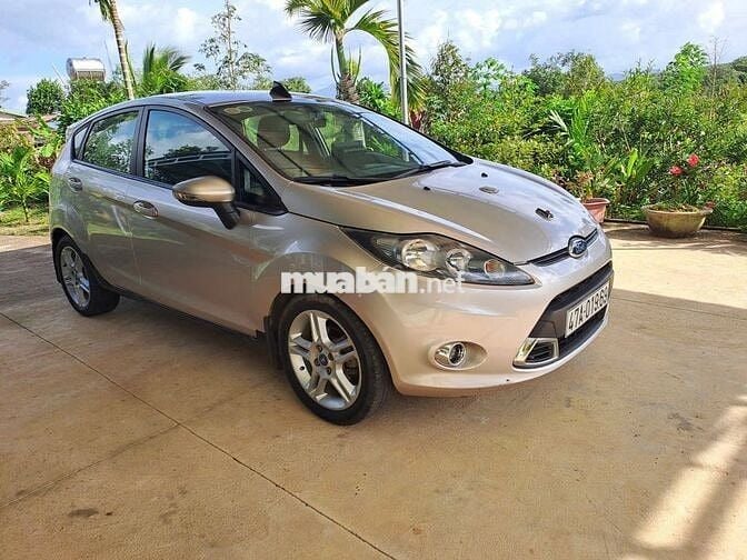 Ford Fiesta ghi vàng,122371 km
