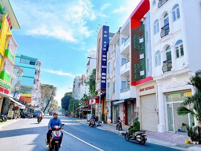 NHÀ 3,5LẦU MT ĐƯỜNG TRẦN HƯNG ĐẠO , PTT , QUẬN TÂN PHÚ