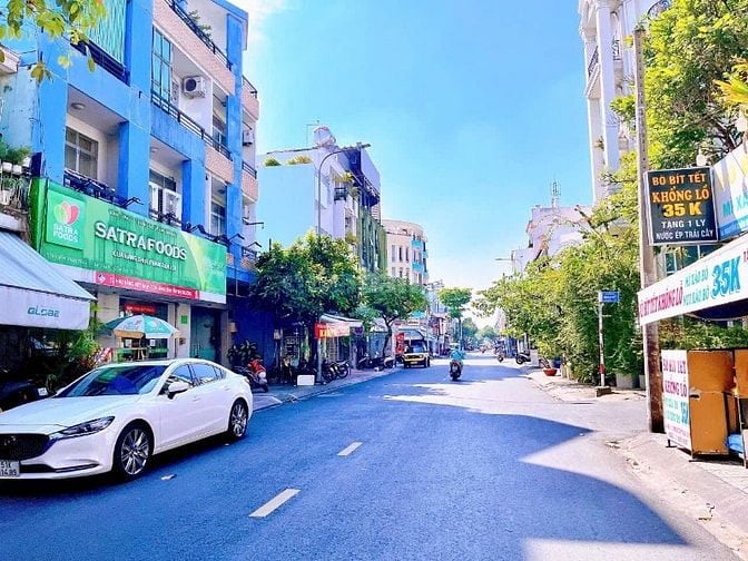 NHÀ 3,5LẦU MT ĐƯỜNG TRẦN HƯNG ĐẠO , PTT , QUẬN TÂN PHÚ