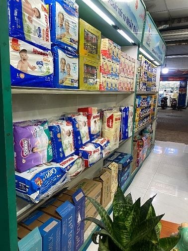 Sang  cửa hàng Sữa Tã - Vé Máy Bay