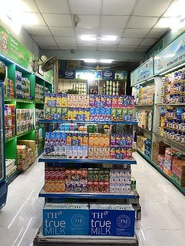 Sang  cửa hàng Sữa Tã - Vé Máy Bay