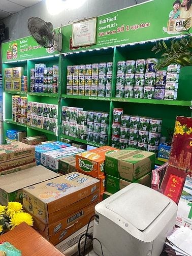 Sang  cửa hàng Sữa Tã - Vé Máy Bay