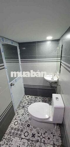 Nhà mặt hẻm 163.6m2, 21 phòng, đường Lương Minh Nguyệt, Q.Tân Phú