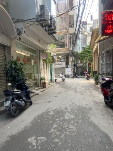 BÁN NHÀ CẠNH KHU QUẬN UỶ ĐỐNG ĐA - 6 TẦNG THANG MÁY - GIÁ 13 TỶ