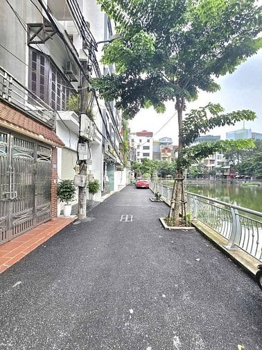 BÁN NHÀ 5 TẦNG MẶT HỒ TRUNG KÍNH TRẦN DUY HƯNG. CẦU GIẤY DT 90 M G 34.