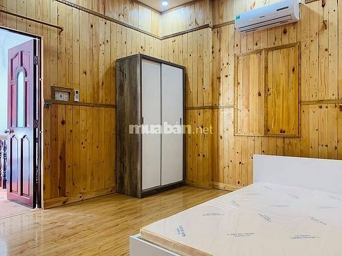 Bán đất tặng 2 căn nhà 1 trệt, 2 lầu, 1 sân, có 8 phòng cho thuê.