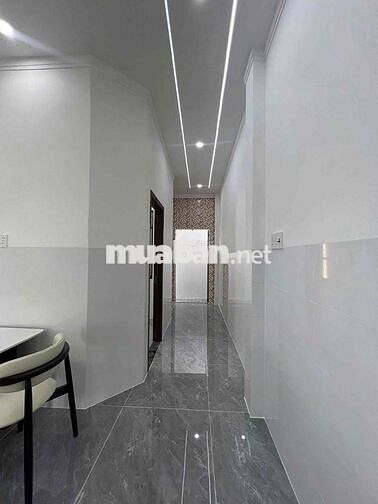 Cần bán căn nhà ngay ngã tư Hội Nghĩa-Tp.Tân Uyên