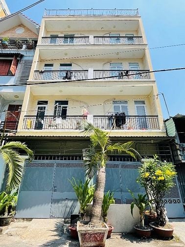 Mặt tiền đường 12m, CMT8 Quận 3 - 100m2( 12x10 ) 4 tầng 14P cho thuê