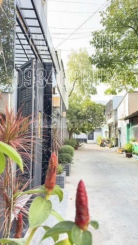 Bán Nhà Trệt Lầu Sân Thượng 4 P.N _ Hẻm Xe Hơi 6M _ Ngay Ủy Ban Nhà Be