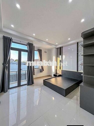 Bán nhà 1 trệt1 lầu sổ hồng riêng ngay chợ Bình Chánh giá 970triệu