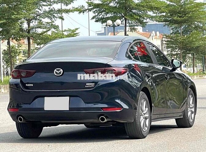 Mazda 3 Deluxe 1.5 AT màu xanh Navi sản xuất 2023