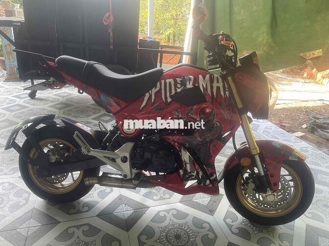 xe cỏ dọn kiểng