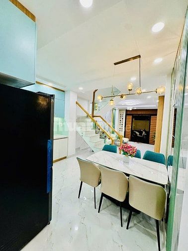 Bán nhà Dt 4m Nở Hậu 5m X 13m Đường xe hơi. Xe tải thông. CÓ PN dưới 