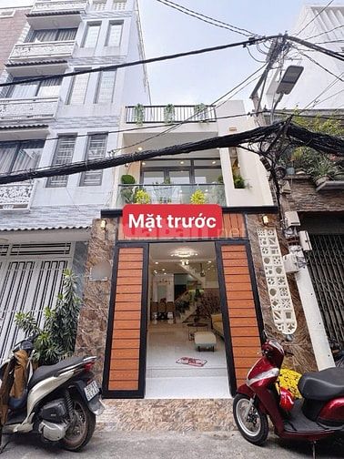 Bán nhà Dt 4m Nở Hậu 5m X 13m Đường xe hơi. Xe tải thông. CÓ PN dưới 